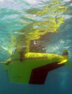 Access into the submarine is via the opening under the tail wing.